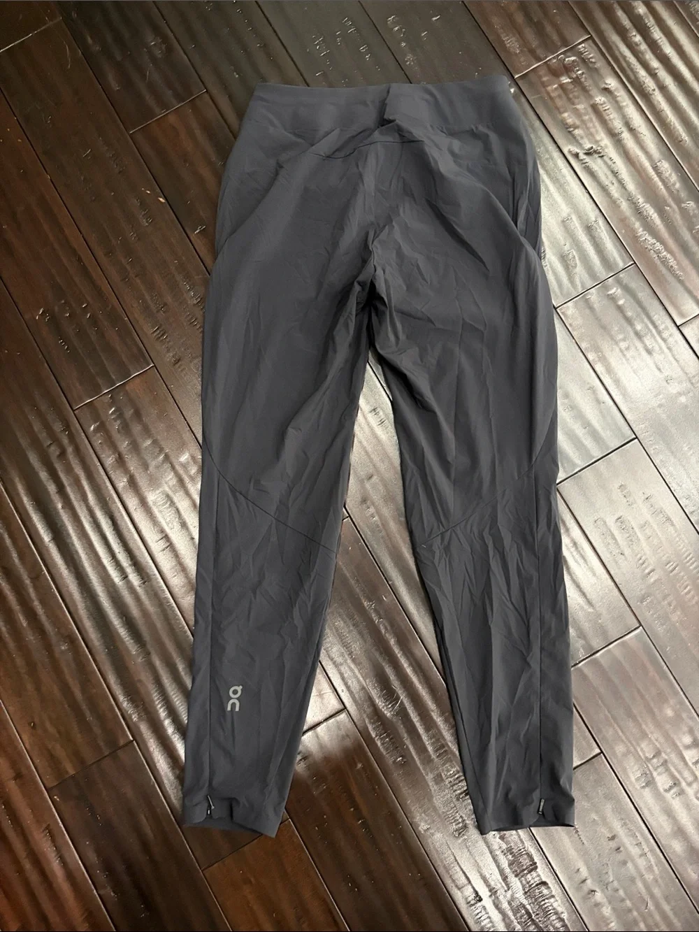 On Running Women's Black Track Joggers with Reflective Logo